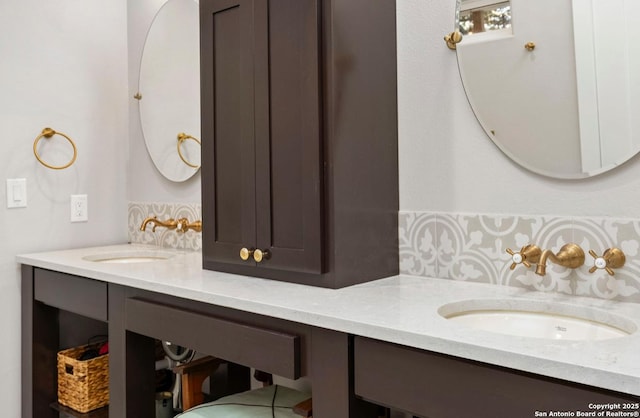 full bathroom with double vanity