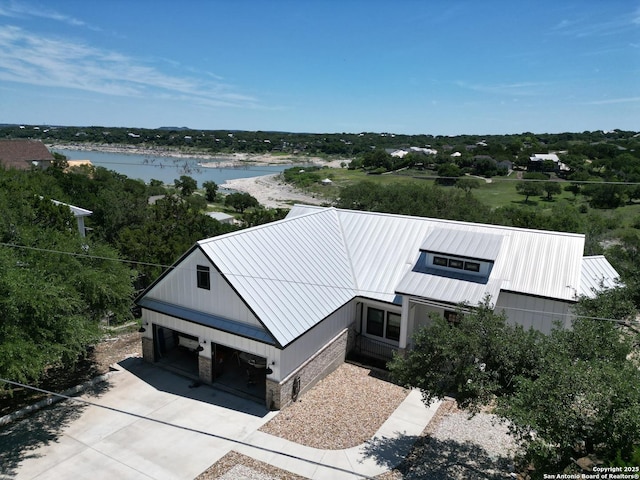 view from above of property with a large body of water