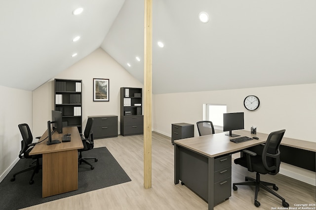 office featuring light wood-type flooring, lofted ceiling, baseboards, and recessed lighting
