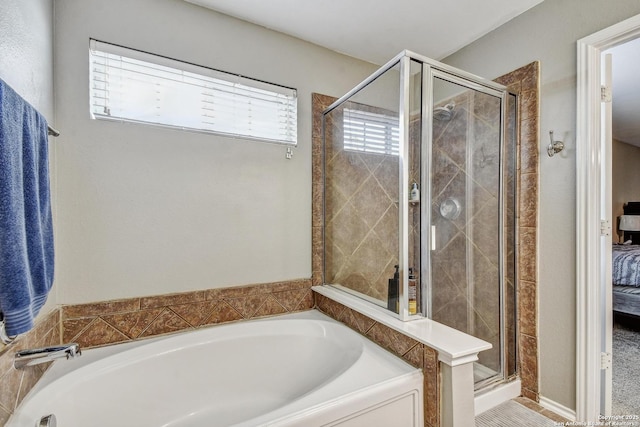 141 Glen Eagles, Cibolo, TX 78108 - ensuite bathroom featuring a shower stall and a garden tub