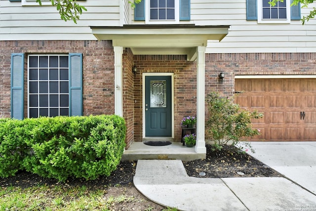 141 Glen Eagles, Cibolo, TX 78108 - doorway to property with brick siding and an attached garage