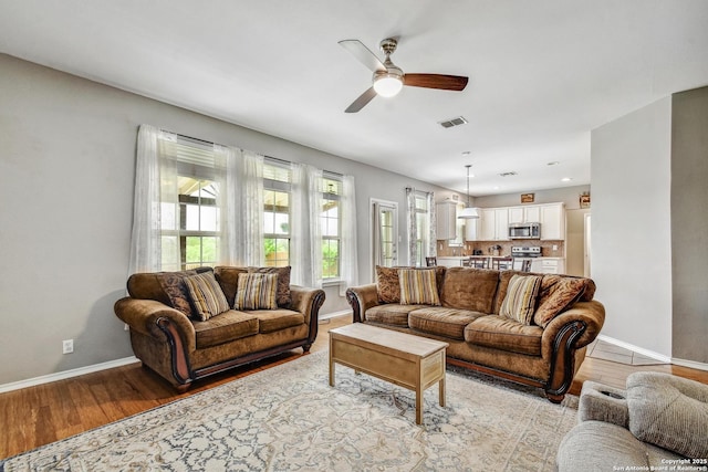 141 Glen Eagles, Cibolo, TX 78108 - living area with ceiling fan, light wood finished floors, baseboards, and recessed lighting