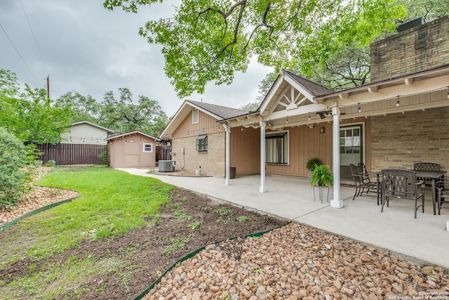 111 Cotillion, Castle Hills, TX 78213 - rear view of property featuring a patio area, board and batten siding, brick siding, and central AC unit