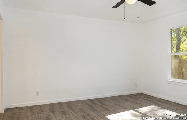 250 Oelkers, San Antonio, TX 78204 - unfurnished room featuring wood finished floors, a ceiling fan, and baseboards