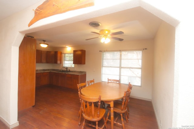 3084 Rustler, Canyon Lake, TX 78133 - dining area featuring dark wood-style floors, ceiling fan, and baseboards