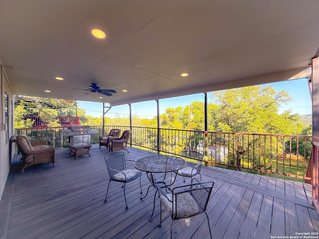 3084 Rustler, Canyon Lake, TX 78133 - wooden deck with a ceiling fan and outdoor lounge area