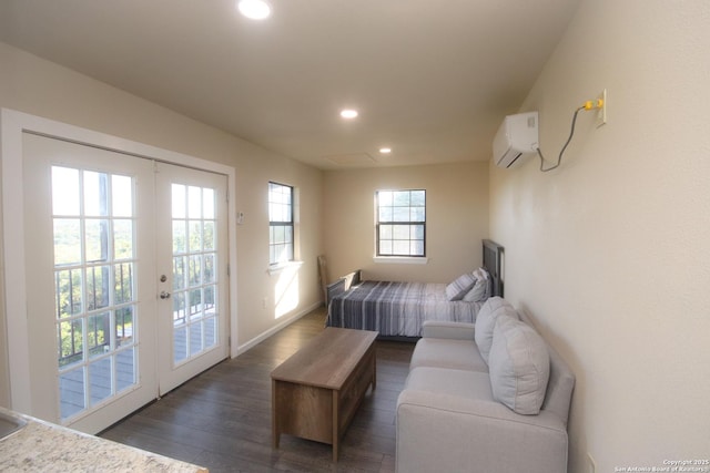 3084 Rustler, Canyon Lake, TX 78133 - bedroom featuring a wall mounted air conditioner, access to exterior, recessed lighting, french doors, and wood finished floors
