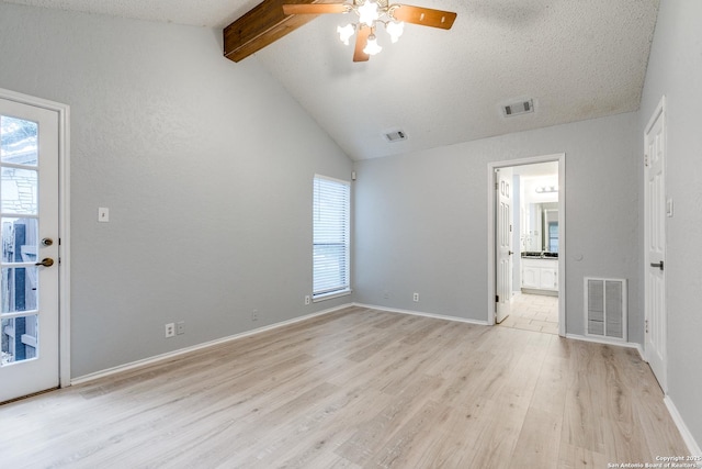 5615 Timber Bark, San Antonio, TX 78250 - unfurnished room featuring plenty of natural light, a ceiling fan, light wood finished floors, a textured ceiling, and baseboards