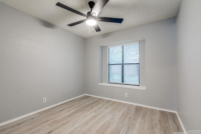 5615 Timber Bark, San Antonio, TX 78250 - unfurnished room featuring wood finished floors, a textured ceiling, ceiling fan, and baseboards