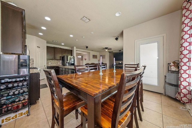 dining area featuring light tile patterned floors, recessed lighting, and a ceiling fan