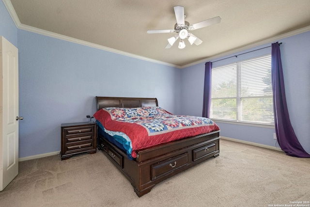 bedroom with light carpet, ornamental molding, baseboards, and a ceiling fan