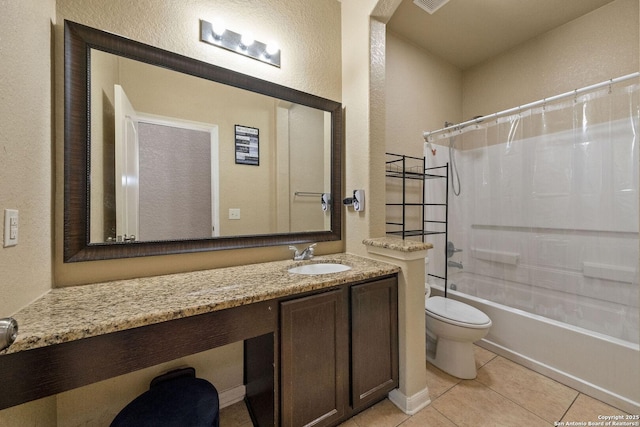 bathroom featuring a textured wall, toilet, tile patterned flooring, vanity, and shower / tub combo