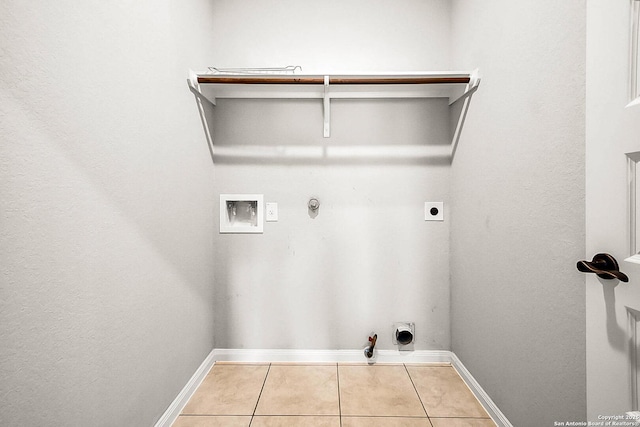 12466 Belfort Pt, Schertz, TX 78154 - washroom with gas dryer hookup, hookup for an electric dryer, hookup for a washing machine, tile patterned floors, and baseboards