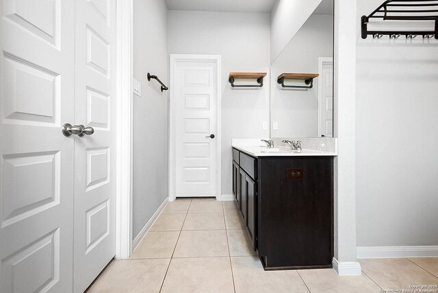 12466 Belfort Pt, Schertz, TX 78154 - bathroom featuring tile patterned flooring, vanity, and baseboards