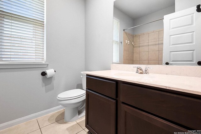 12466 Belfort Pt, Schertz, TX 78154 - bathroom featuring tile patterned floors, toilet, vanity, and baseboards