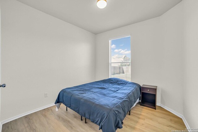 3628 Lazy Diamond, Selma, TX 78154 - bedroom featuring wood finished floors and baseboards