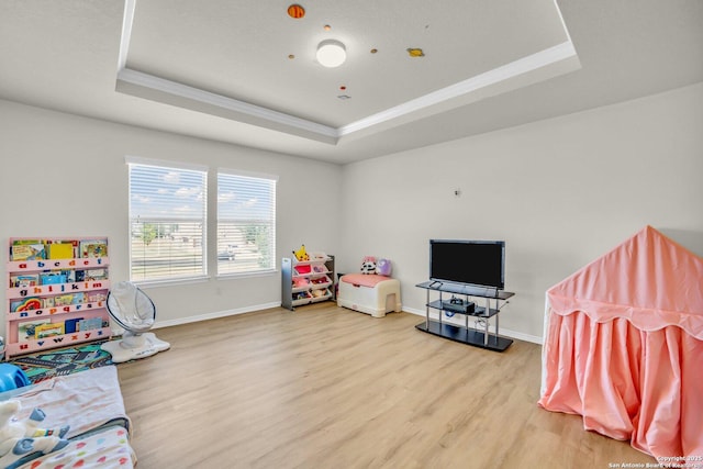3628 Lazy Diamond, Selma, TX 78154 - playroom featuring a raised ceiling, light wood-type flooring, ornamental molding, and baseboards