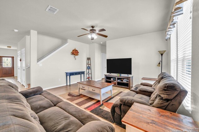 3628 Lazy Diamond, Selma, TX 78154 - living room with a ceiling fan, baseboards, and light wood-type flooring