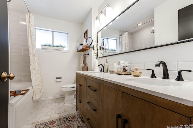 7500 Callaghan Rd Unit 108, San Antonio, TX 78229 - bathroom with healthy amount of natural light, toilet, tile patterned floors, and shower / bath combo
