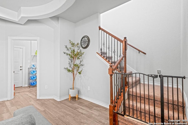 8502 Kallison Arbor, San Antonio, TX 78254 - staircase featuring wood finished floors and baseboards