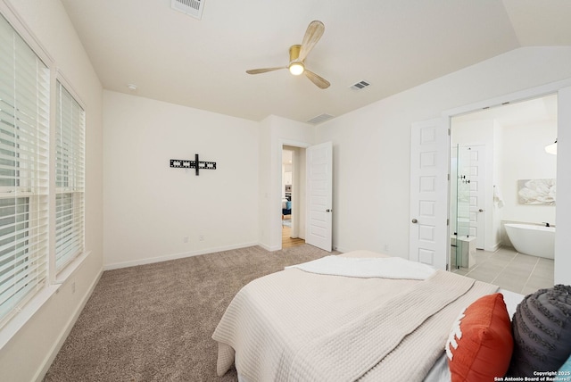 2230 Bennett Ave, New Braunfels, TX 78132 - bedroom featuring light carpet, baseboards, a ceiling fan, and connected bathroom