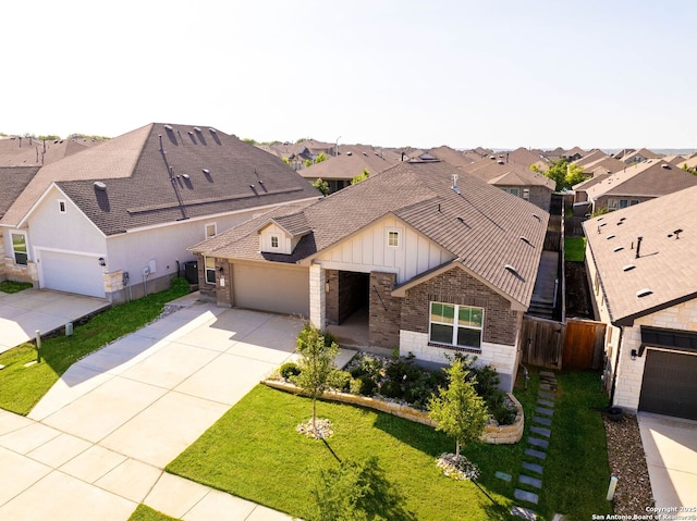 2230 Bennett Ave, New Braunfels, TX 78132 - view of front of property featuring brick siding, a garage, driveway, and a residential view