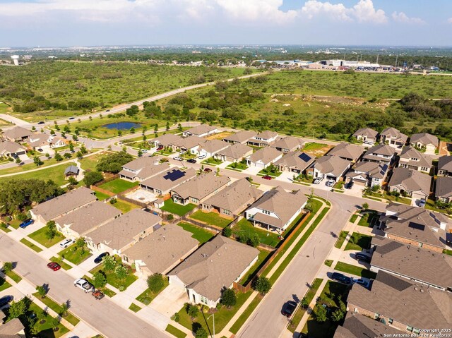 2230 Bennett Ave, New Braunfels, TX 78132 - aerial view of property and surrounding area with a large body of water and nearby suburban area