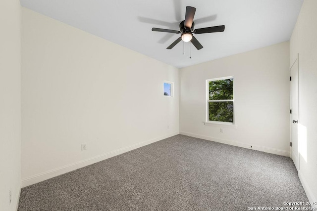 1310 S Mesquite, San Antonio, TX 78210 - empty room with carpet floors, a ceiling fan, and baseboards