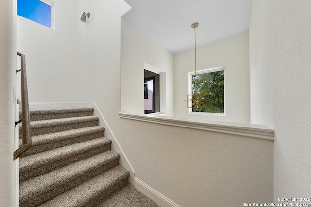 1310 S Mesquite, San Antonio, TX 78210 - staircase with baseboards and carpet flooring