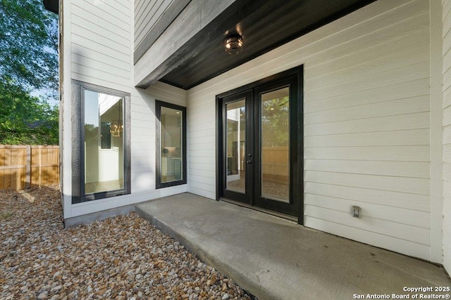 1310 S Mesquite, San Antonio, TX 78210 - doorway to property with fence and french doors