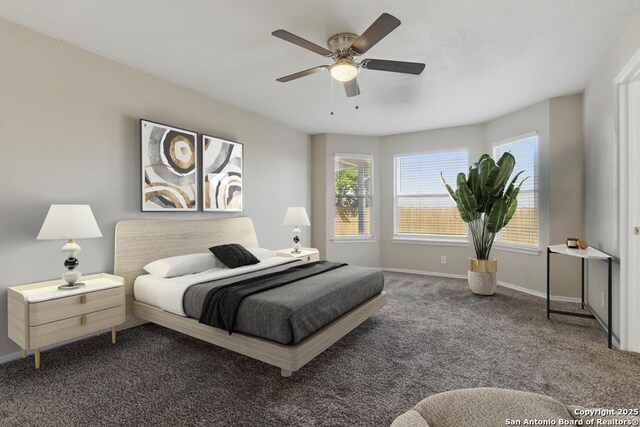 bedroom featuring carpet, baseboards, and a ceiling fan