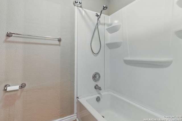 bathroom with shower / bathtub combination
