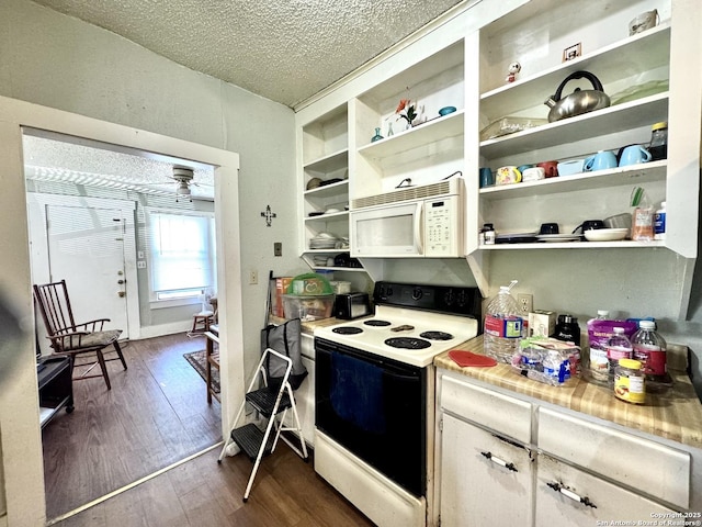 512 E Travis St, Luling, TX 78648 - kitchen with white appliances, open shelves, dark wood-type flooring, a textured ceiling, and light countertops