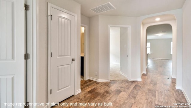 310 Steele Hbr, Cibolo, TX 78108 - hallway featuring wood finished floors and arched walkways