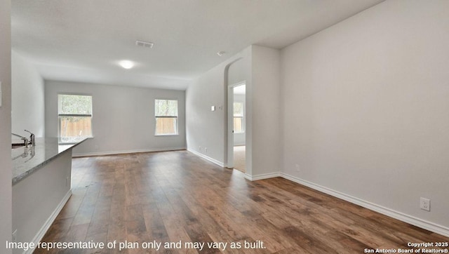 310 Steele Hbr, Cibolo, TX 78108 - unfurnished living room with wood finished floors and baseboards