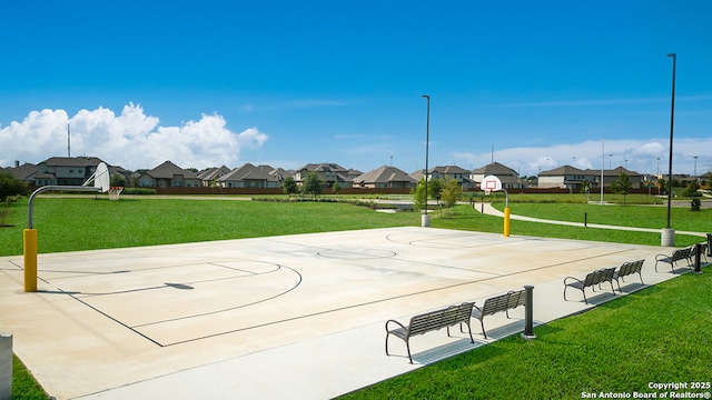 310 Steele Hbr, Cibolo, TX 78108 - view of basketball court with a residential view, community basketball court, and a lawn
