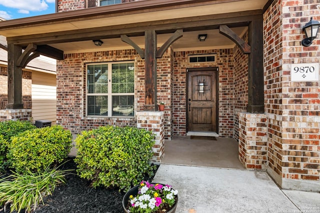 9870 Mulhouse, Schertz, TX 78154 - property entrance with brick siding and a porch