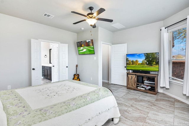 9870 Mulhouse, Schertz, TX 78154 - bedroom featuring baseboards, ceiling fan, and connected bathroom