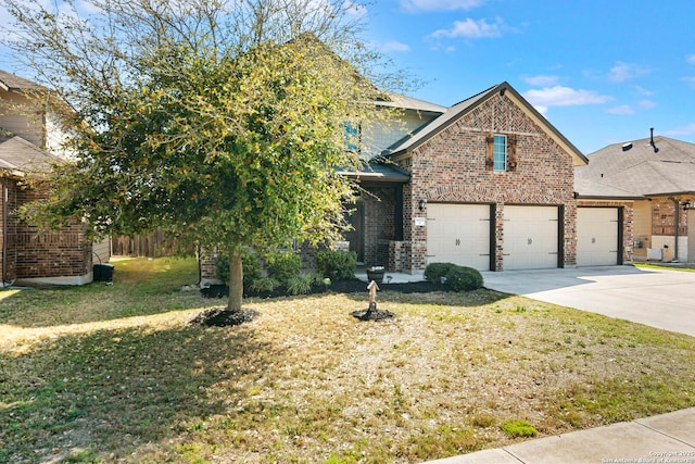 9870 Mulhouse, Schertz, TX 78154 - view of front of house featuring brick siding, driveway, a front lawn, and a garage
