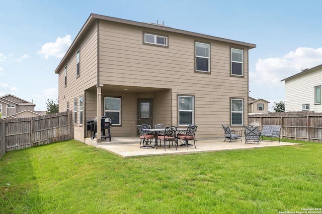 back of house with a patio