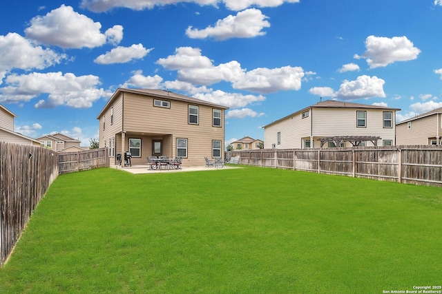 rear view of house with a patio area