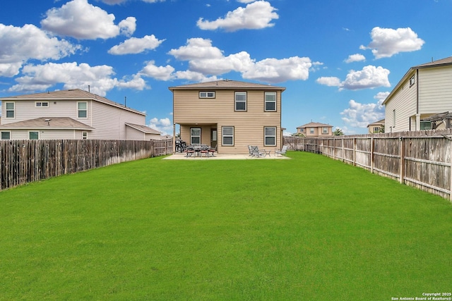 rear view of property featuring a patio