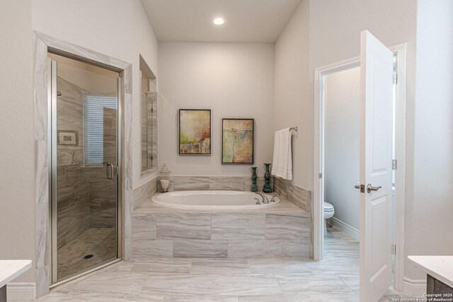 14206 Swift Breeze, San Antonio, TX 78254 - full bathroom with a garden tub, a shower stall, toilet, vanity, and marble finish floors