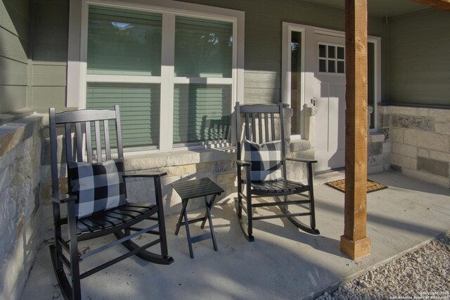 1139 Cedar Bnd, Canyon Lake, TX 78133 - view of patio featuring covered porch