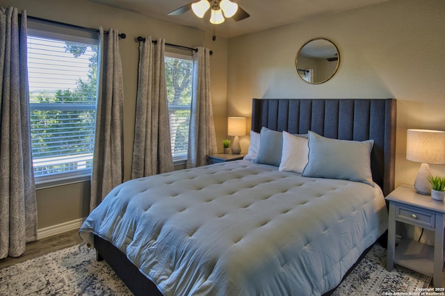 1139 Cedar Bnd, Canyon Lake, TX 78133 - bedroom with baseboards and wood finished floors