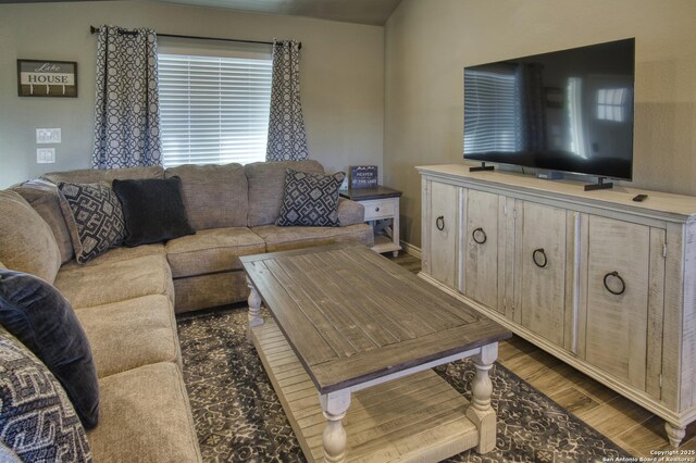 1139 Cedar Bnd, Canyon Lake, TX 78133 - living area with wood finished floors and baseboards