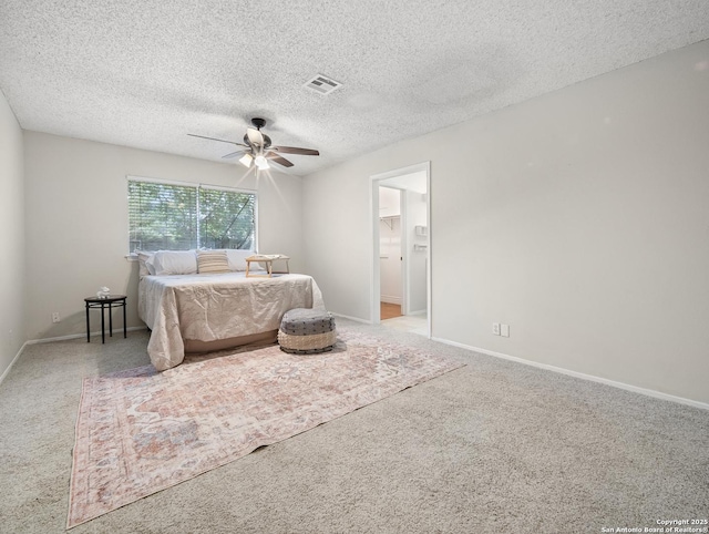 bedroom featuring carpet, a textured ceiling, ceiling fan, and baseboards