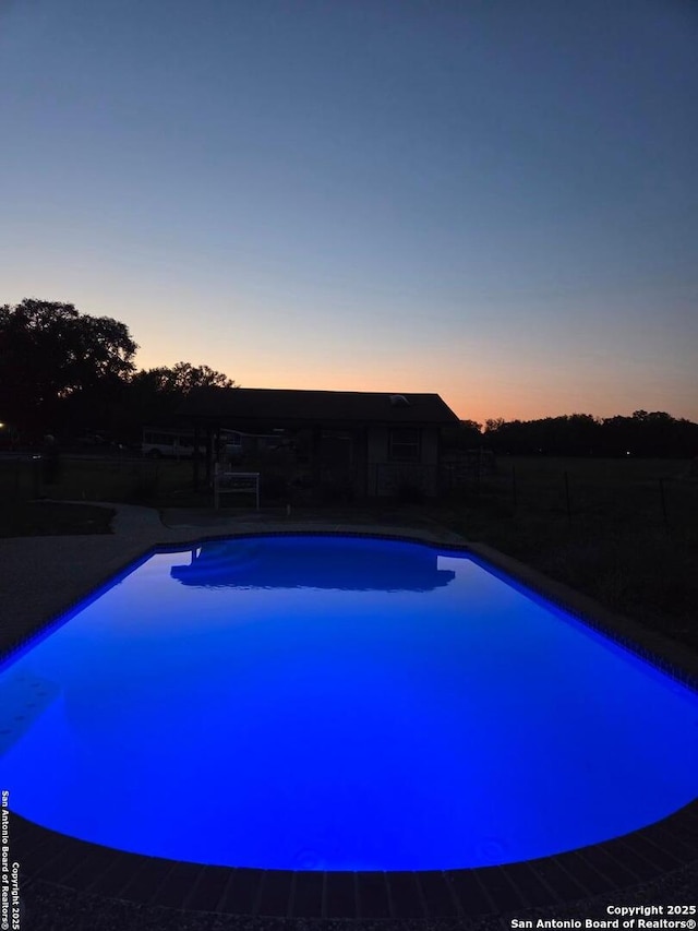 10180 Aliann, Atascosa, TX 78002 - view of pool featuring fence