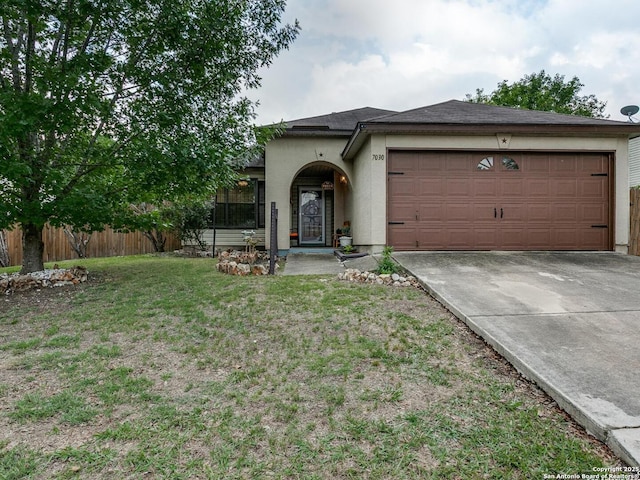 7030 Purple Rdg, San Antonio, TX 78233 - view of front of property featuring concrete driveway, an attached garage, and stucco siding