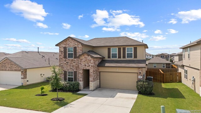 traditional home featuring driveway, brick siding, an attached garage, central AC, and roof with shingles